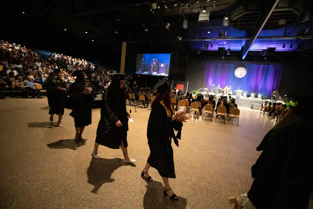 Graduates walking in a line