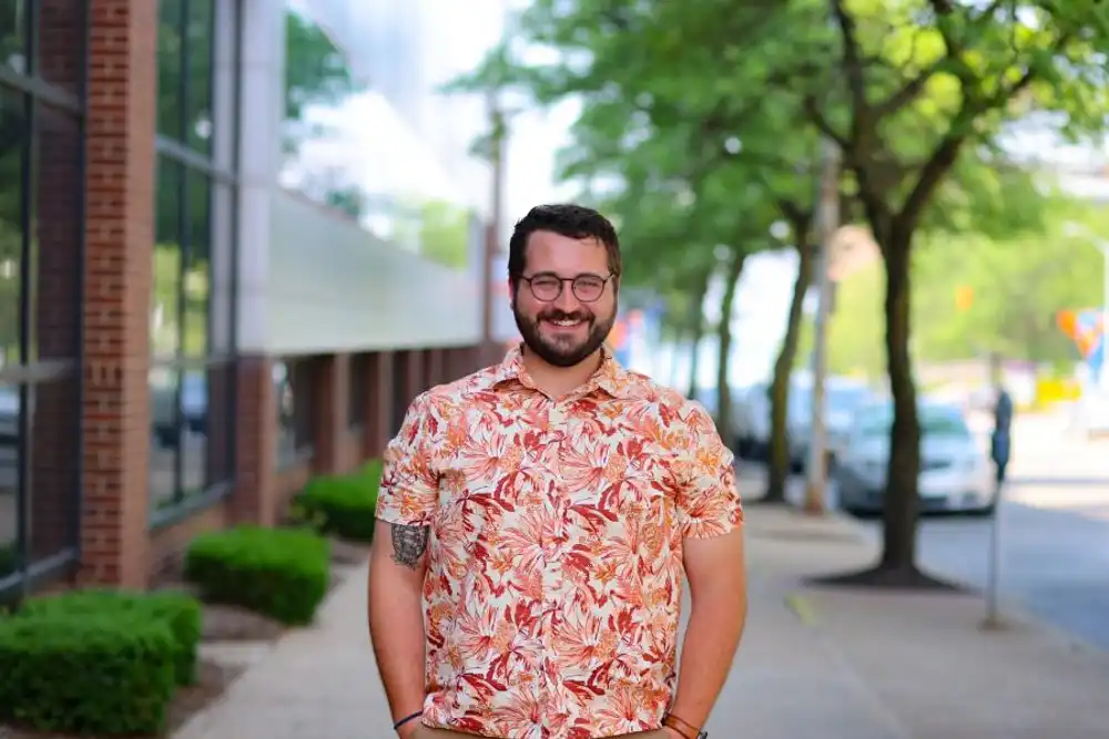 Jordan Fuller standing in downtown Erie