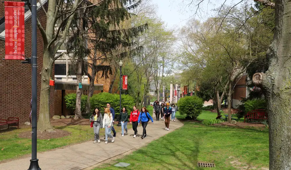 Students walking through AJ Ways on Erie Campus