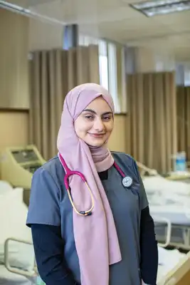 Headshot of Amina Dhaher