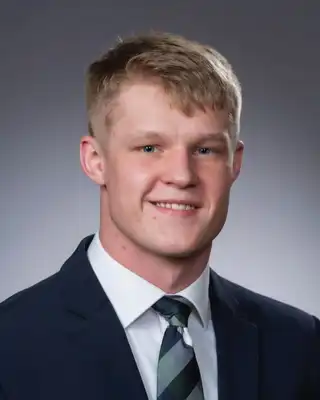Headshot of Owen Balas