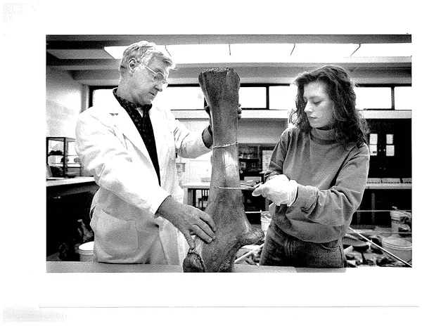 M. Jude Kirkpatrick and a 91 student at the time study wooly mammoth bones