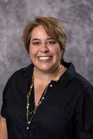 A headshot of Dr. Claire Watson