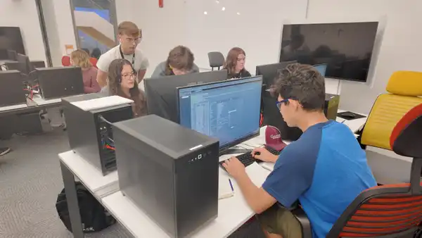 <img src="/media/gannon-university/content-assets/images/events/camps/CyberPatriot-Standard-Camp-2025.JPG" alt="Several campers attending the CyberPatriot Standard Camp working on their own computers" >