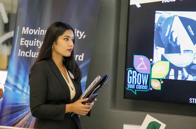 Student attending the career fair at 91.