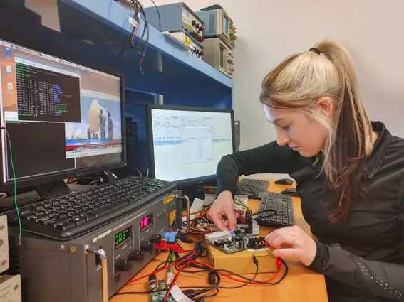 Engineering student working in lab.
