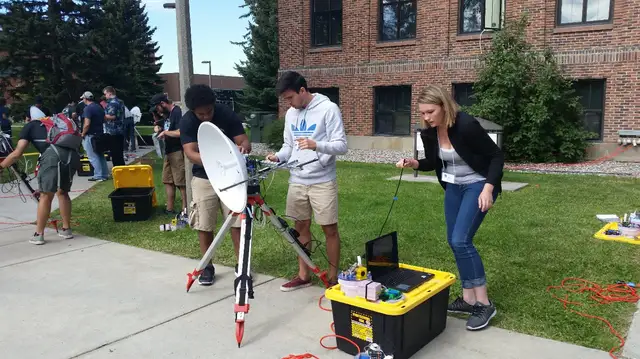 Three team members and the faculty advisor Dr. Wookwon participate in a workshop sponsored by their ballooning team and NASA.