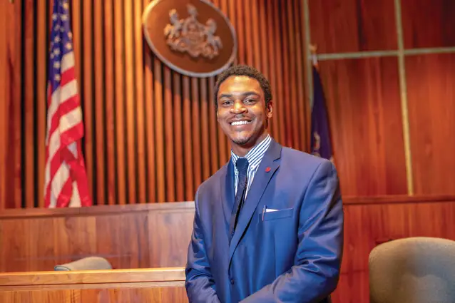 Student inside a courtroom.