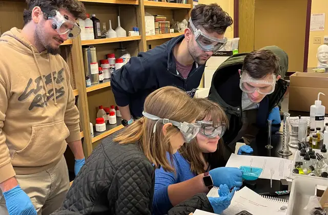 Students sitting around a chemistry lab