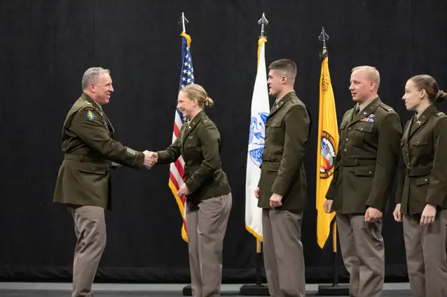ROTC students participating in a commissioning ceremony.