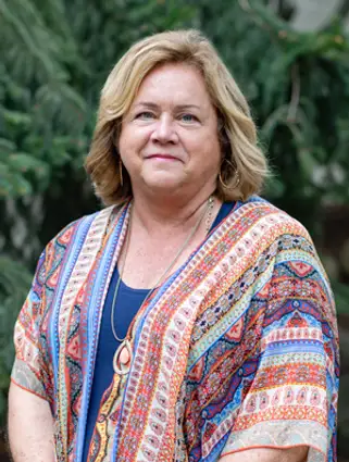 Image of Dawn standing outside smiling