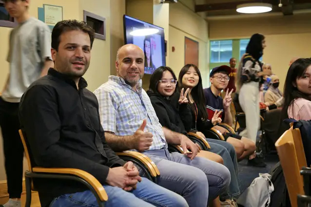Students attending an ESL graduation ceremony.