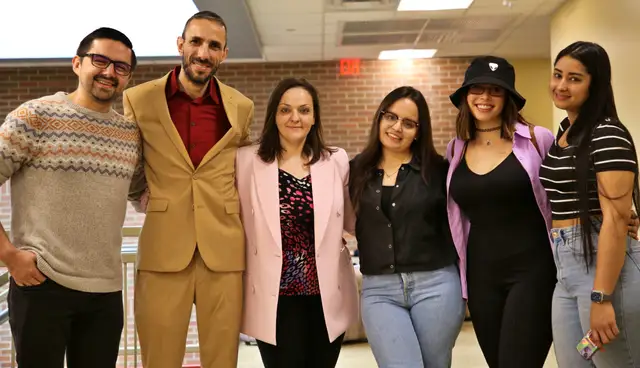 ESL students attending graduation.