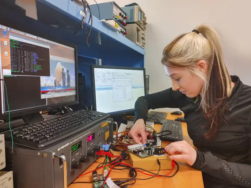 Engineering student working in lab.
