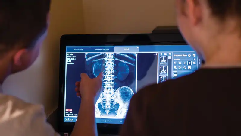 Students reading an x-ray