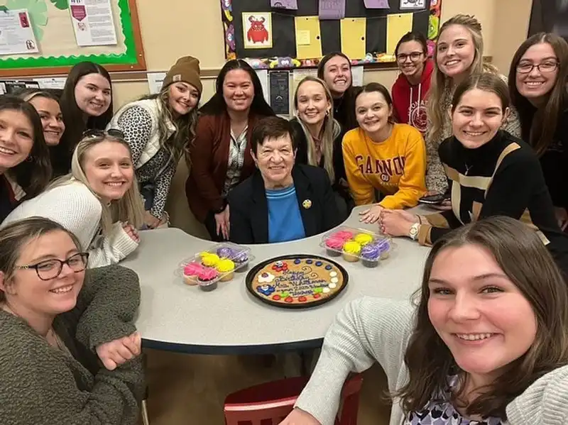 Janice Whiteman celebrating her birthday with her students