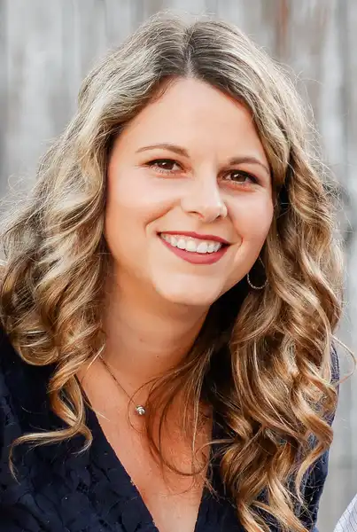 Meghan Finton smiles at the camera in a headshot