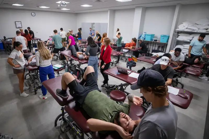A wide-angle shot of a Physical Therapy room where students get hands on training in assisting patients.