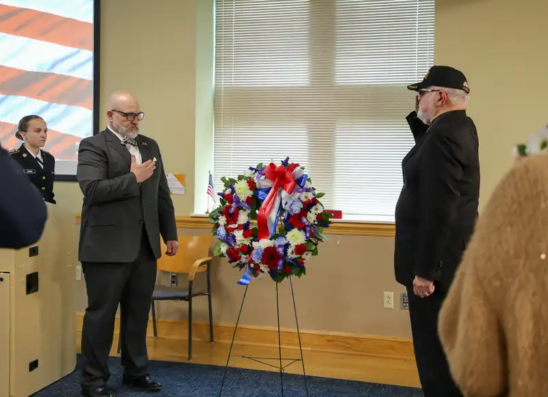 President Iwanenko and Lt. Col. (Ret.) Peter Correa lay a wreath in remembrance of those currently serving, those who have served and those who have given their lives to their country.