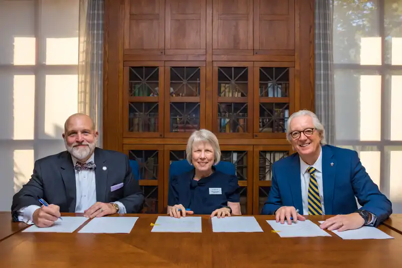 Presidents of 91 University and Ursuline College signing a Letter of Intent to enter a strategic partnership