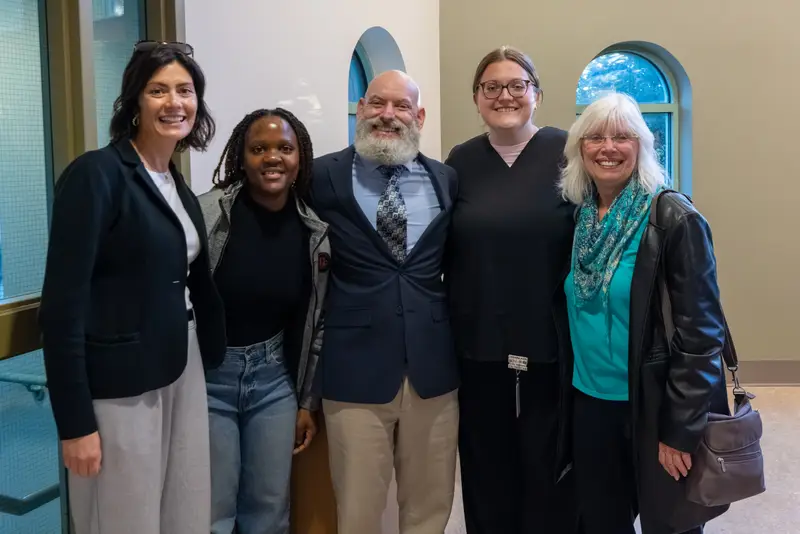 Students and faculty post with Dr. Tom Harter