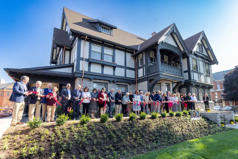Blessing and dedication of new Alumni House during Centennial Homecoming and Family Weekend