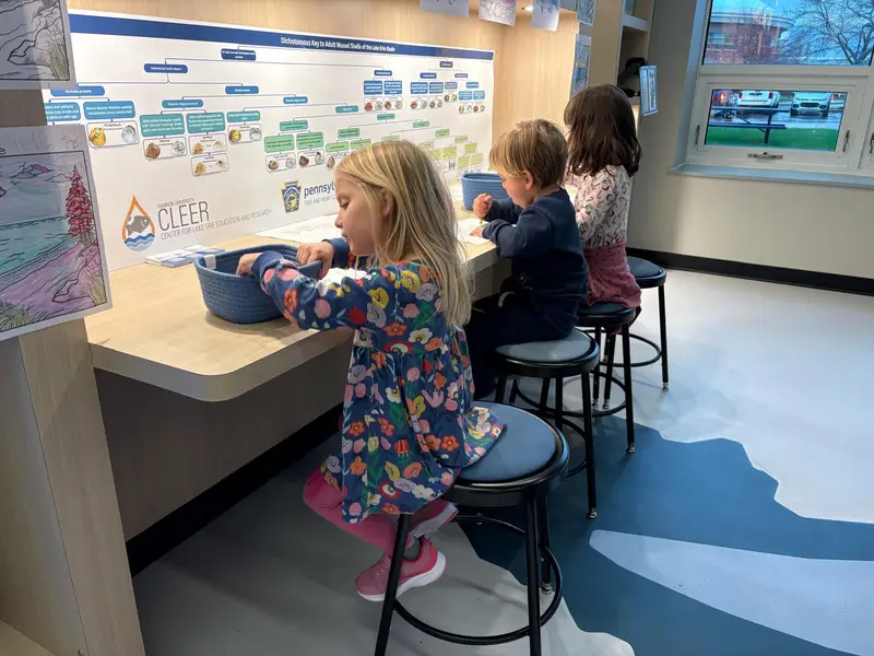 Kids coloring at CLEER in the Blasco Library