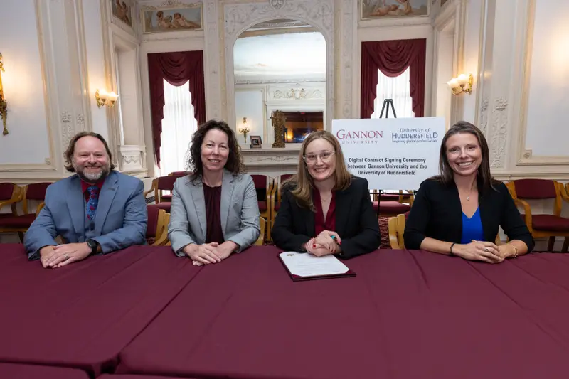 Leaders at Gannon University pose following the signing of the MoU with University of Huddersfield