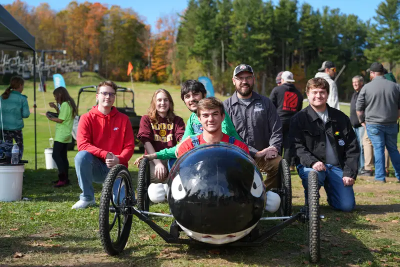 A photo of the ������Ƶ MakerSpace team with their Peek'n Peak soapbox derby car