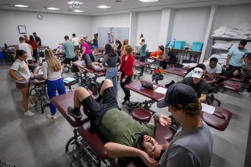 A wide-angle shot of a Physical Therapy room where students get hands on training in assisting patients.