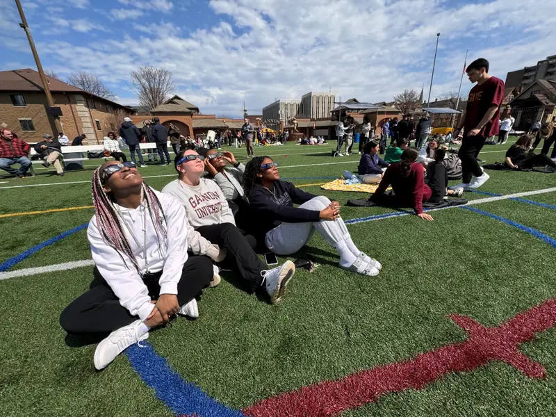 Students gathered at locations across campus, including McConnell Family Stadium and Friendship Green.
